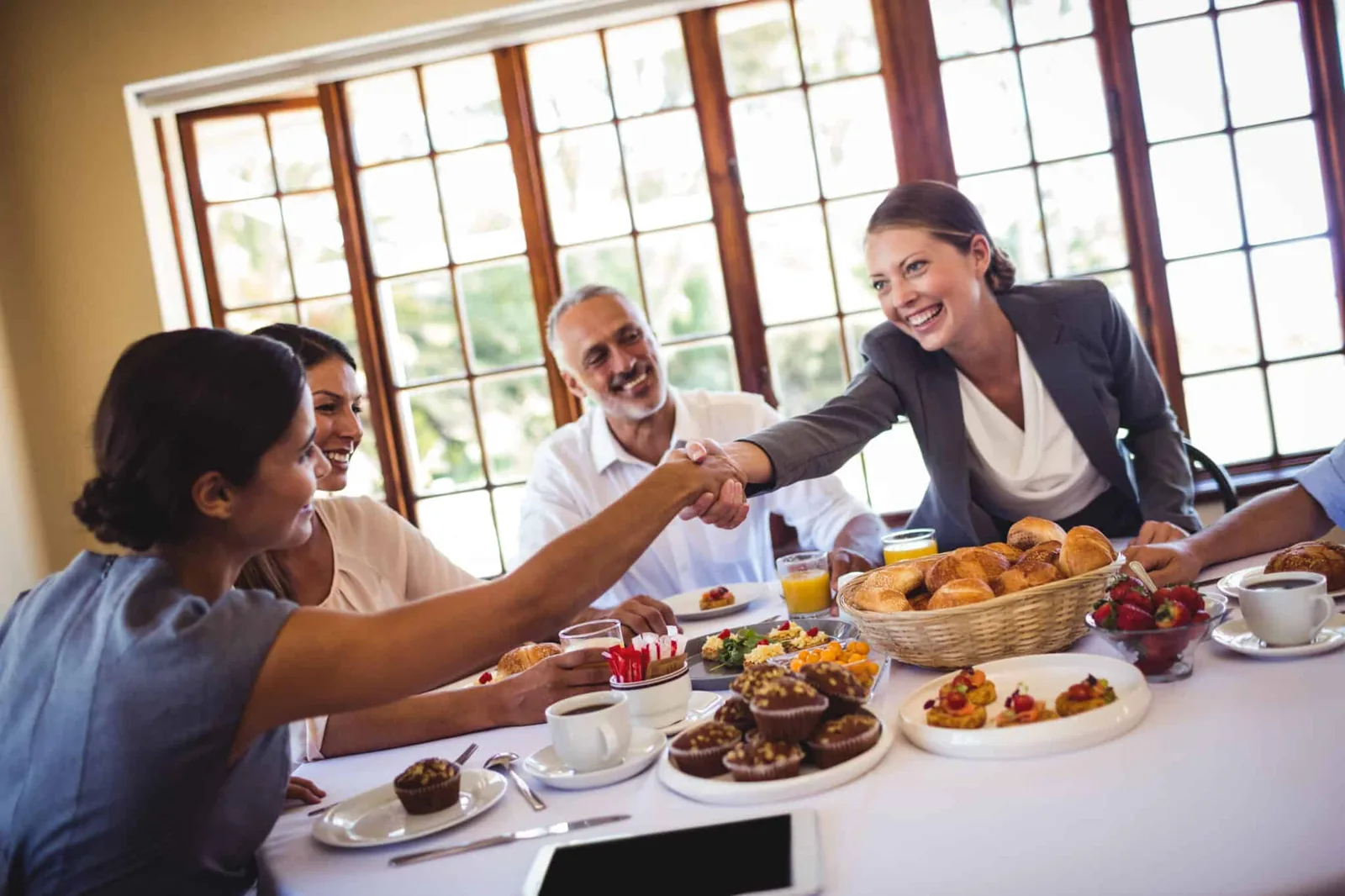 Restaurant owners shaking hands