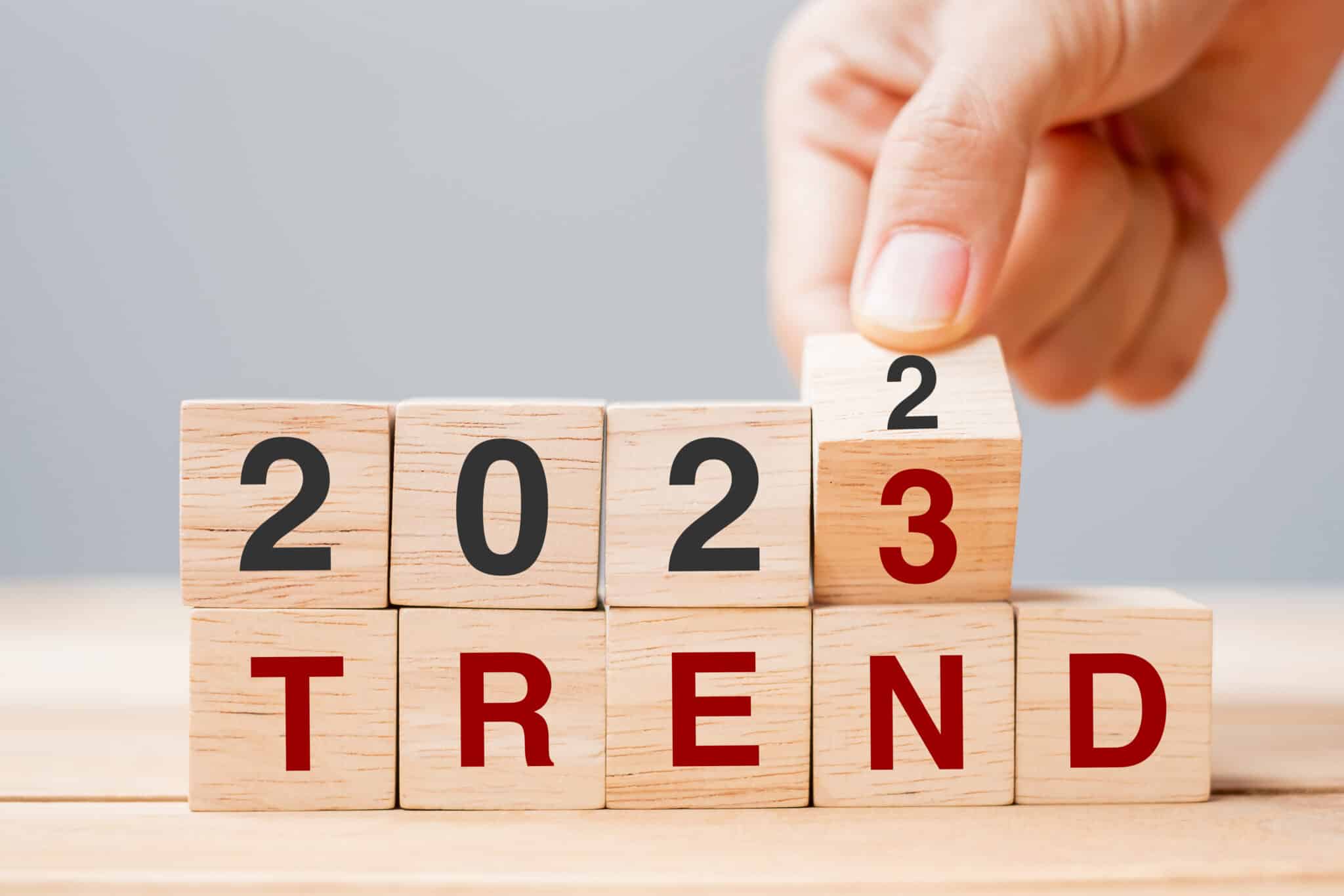 Hand Flipping Block 2022 To 2023 Trend Text On Table. Resolution